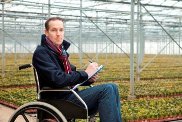 East Baton Rouge Parish Library| image: Man-in-wheelchair-in-greenhouse_small-360×242